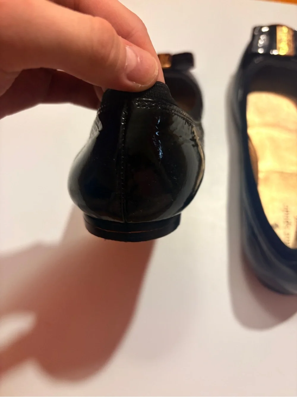 kate spade Black Patent Leather Bow Flats with Gold Plaque